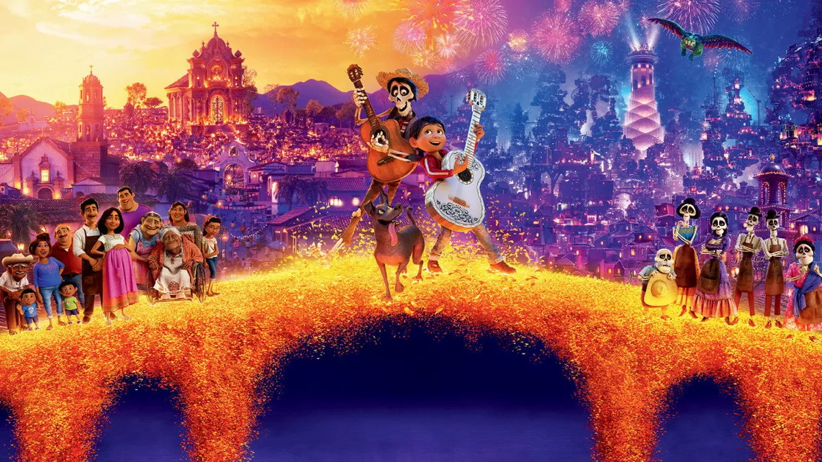 Miguel and his family crossing a marigold bridge into the colorful Land of the Dead in Coco
