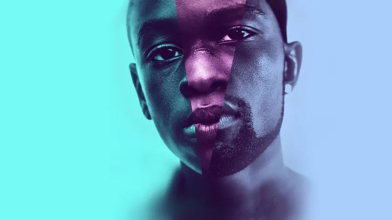 The face of Chiron lit in blue and purple in Moonlight key art